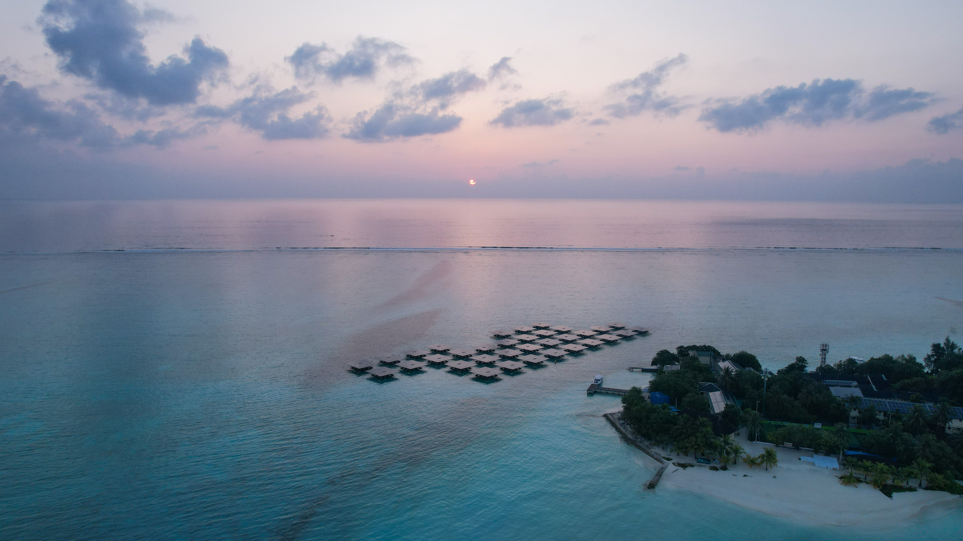 The TAJ Maldives Floating Photovoltaic project The TAJ Maldives Floating Photovoltaic project at dawn - arial view